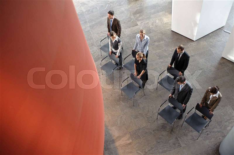 Group of business people with chairs, stock photo