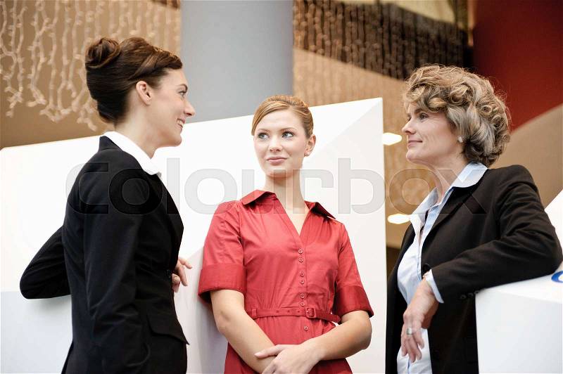 Business people having informal meeting, stock photo