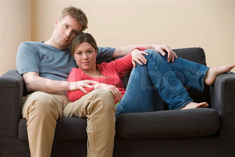 Couple on sofa, stock photo