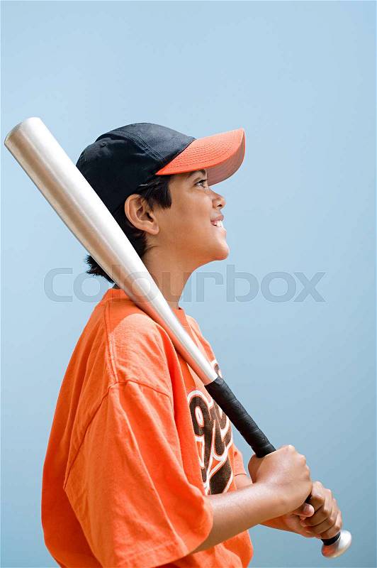 Boy with baseball bat, stock photo
