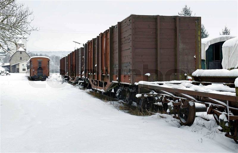 Old railway car at winter time, stock photo