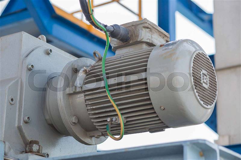 Induction motor with gear set in industrial factory, stock photo