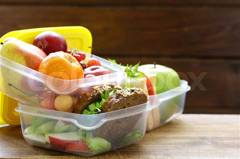 Sandwiches with vegetables and fruits lunch box for healthy eating, stock photo