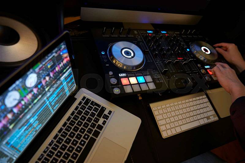 Cut in of DJ Decks and Laptop Computer, stock photo
