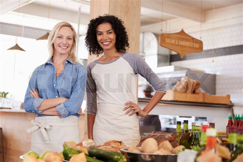 Portrait Of Female Staff In Organic Food Store, stock photo