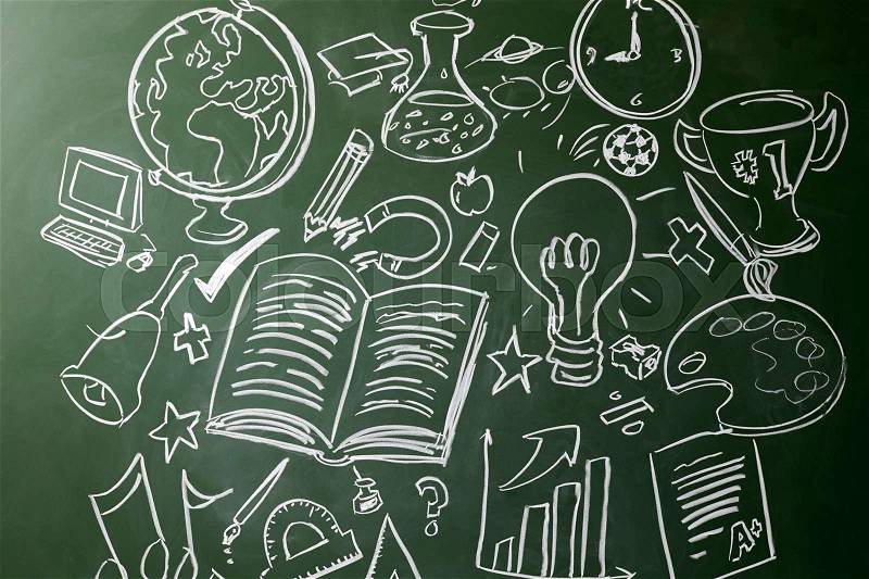 Hand drawn symbols of school subjects on a chalkboard, stock photo