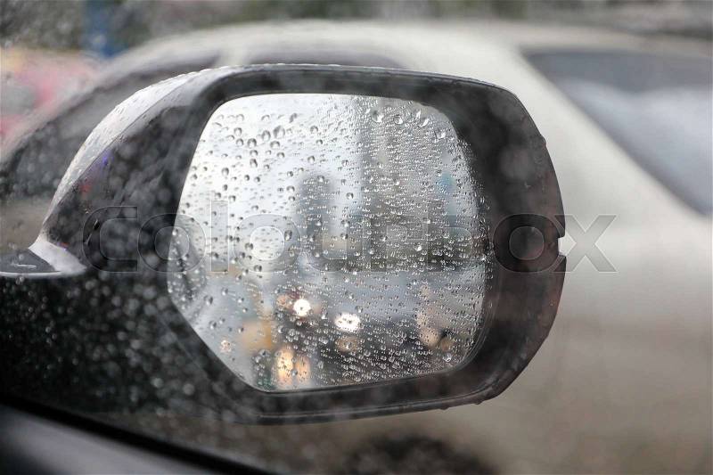 Background of car outside mirrow with rain, stock photo