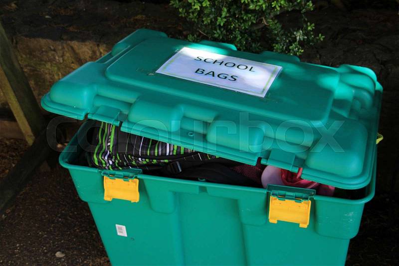 As a precaution, returning school bags in plastic box for entering Leeds Castle, stock photo