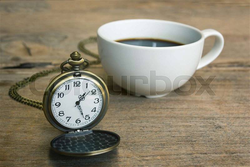 Pocket watch with coffee latte art, relax time , stock photo