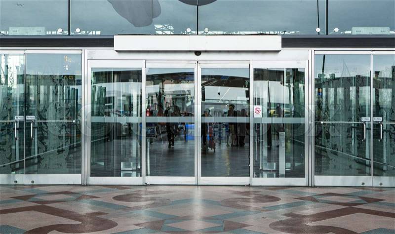 Airport terminal building gate entrance and automatic glass door , stock photo