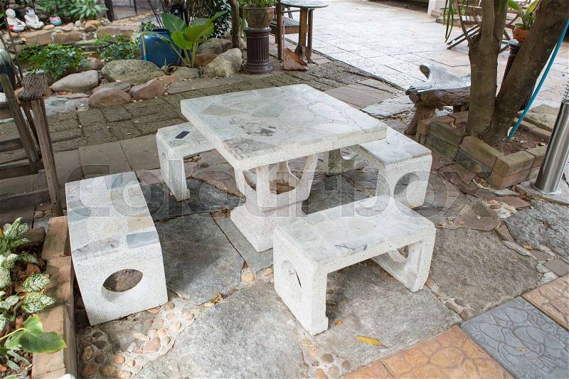 Stone table chair in the park and resting area, stock photo