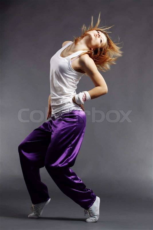 Teenage girl dancing hip-hop studio series, stock photo
