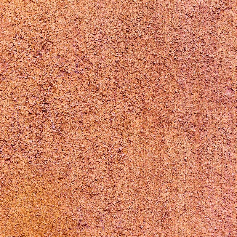 Closeup of a rustic brown plastered wall, to be used as texture or background, stock photo