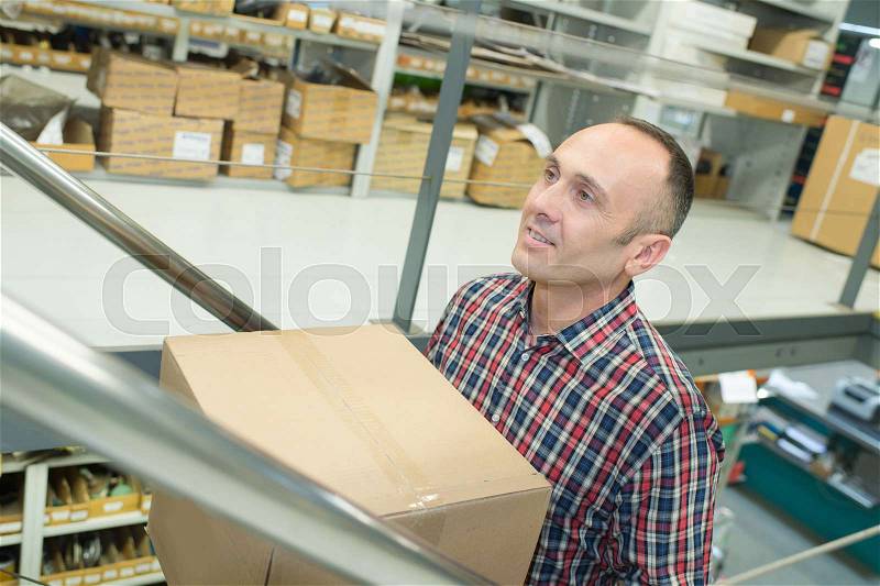 Carrying the box, stock photo