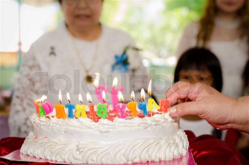 Happy birthday cake for senior woman, lifestyle concept, stock photo