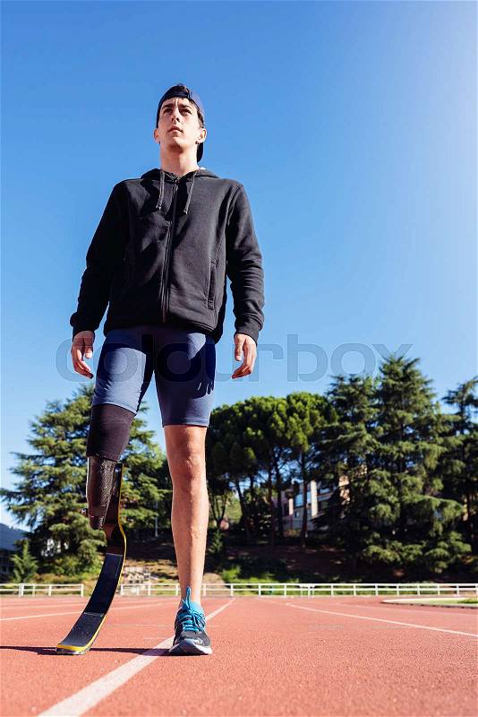 Portrait of disabled man athlete with leg prosthesis. Paralympic Sport Concept, stock photo