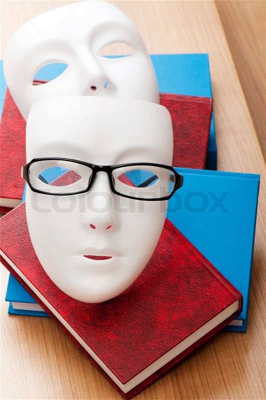 Reading concept with masks, books and, stock photo