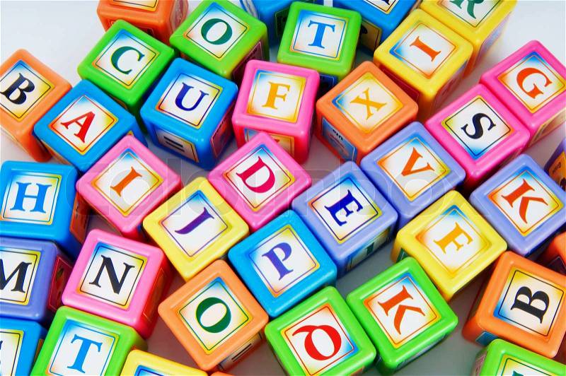 Learning and education concept - pile of alphabet blocks, stock photo