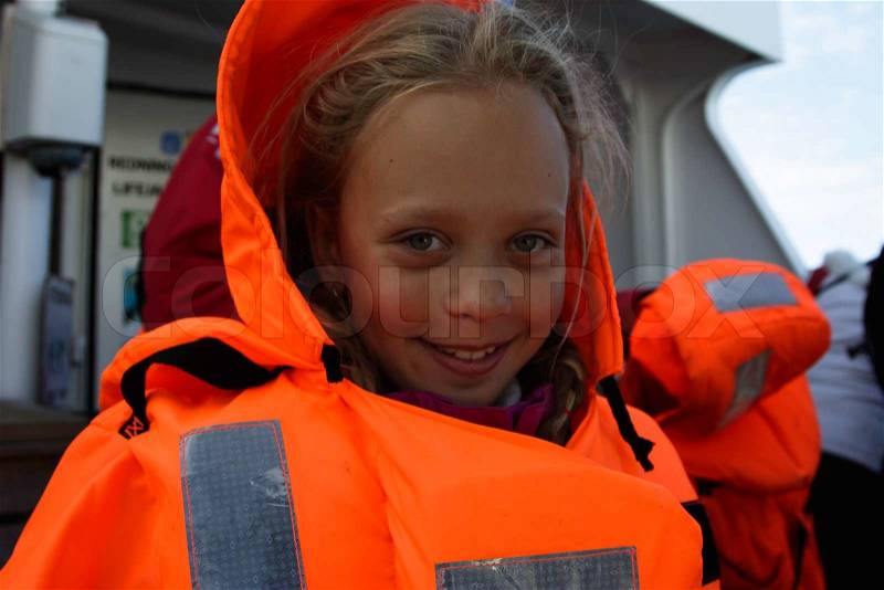 Girl in life jacket, stock photo