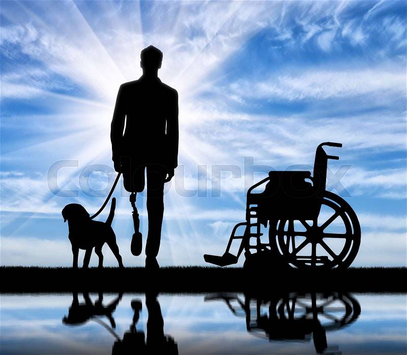 Disability and rehabilitation. Disabled man with prosthetic leg walks without a wheelchair with a dog on the river, stock photo