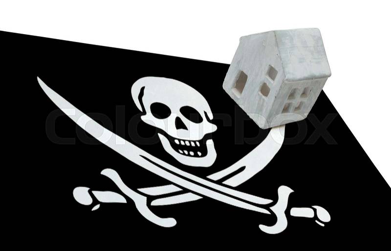 Small house on a flag - Pirate flag, stock photo
