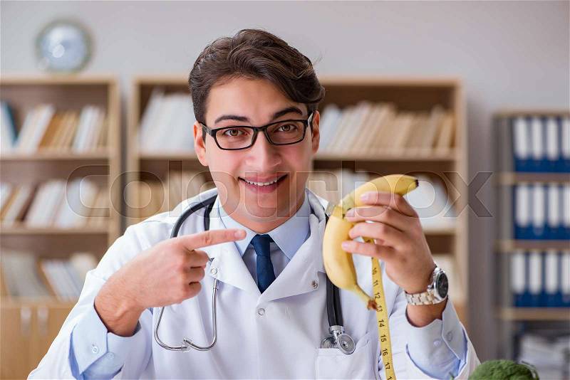 Scientist studying nutrition in various food, stock photo