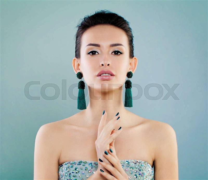 Fashion Beauty Portrait of Cute Young Woman with Earrings. Beautiful Fashion Model, stock photo