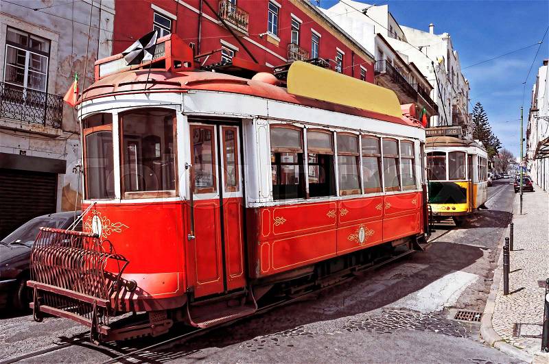 View of two typical old trams in Lisbon, Portugal, stock photo