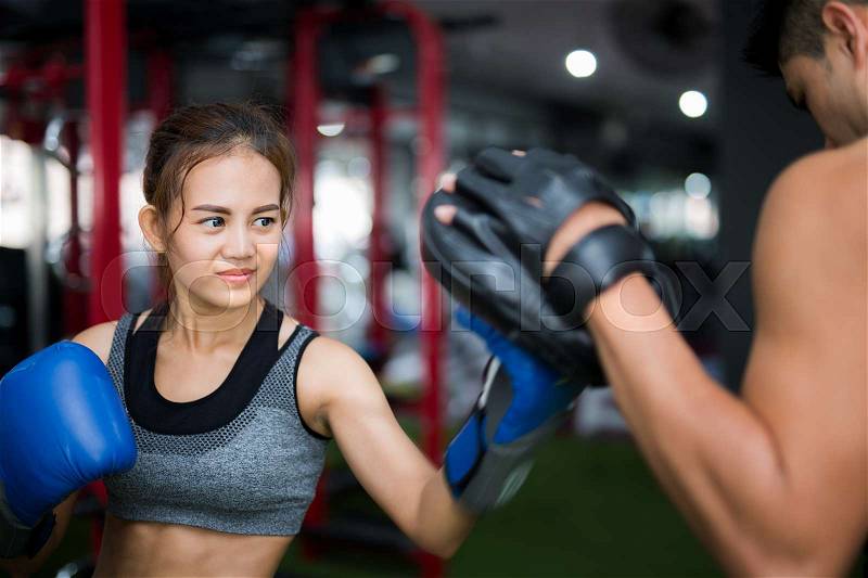 Woman ttaining for Fitness boxing in Thailand Gym, Fitness, exercise, slim and healthy concept, stock photo