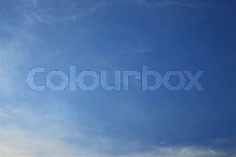 Beautiful wind moving cloud above clear blue sky background, stock photo