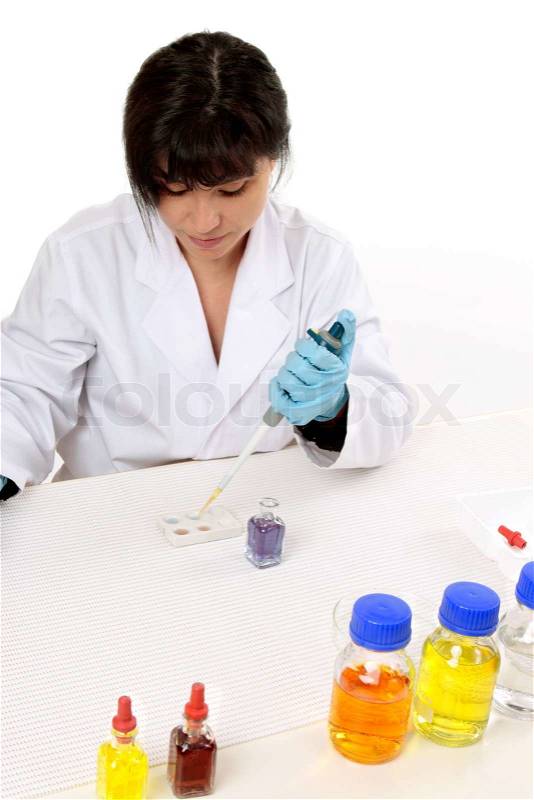 Looking down on a laboratory worker doing research, stock photo