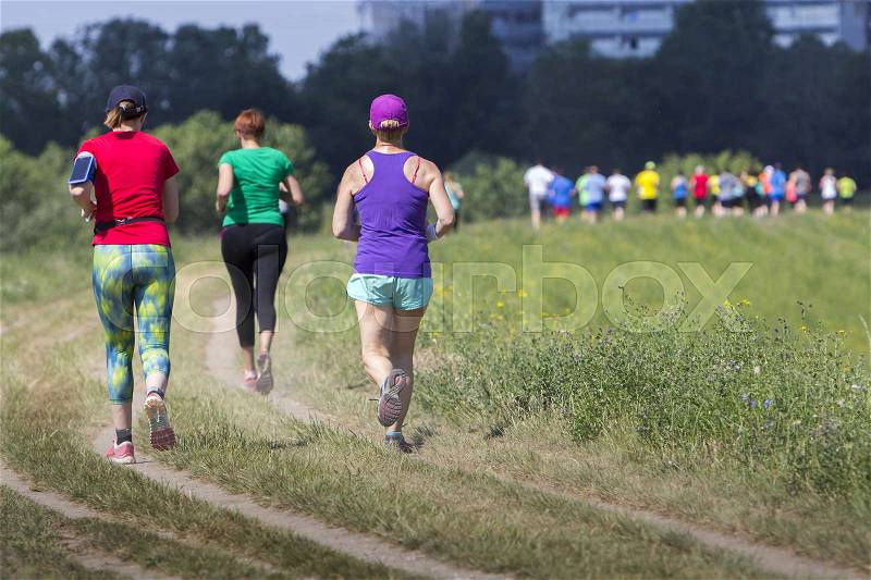 Group of young people on Outdoor cross-country running marathon , stock photo