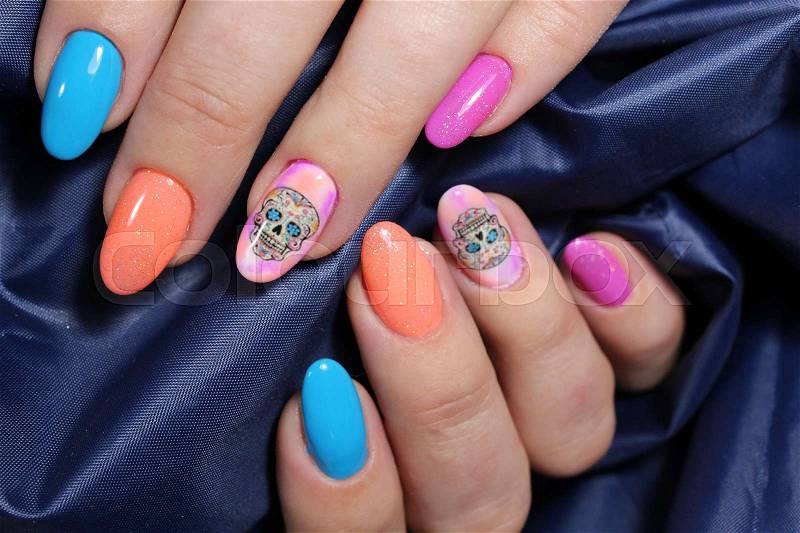Multicolored nail design with beautiful pattern, stock photo