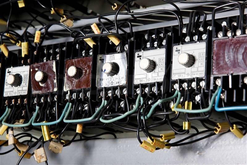 Old control panel with static energy meters and circuit-breakers, stock photo