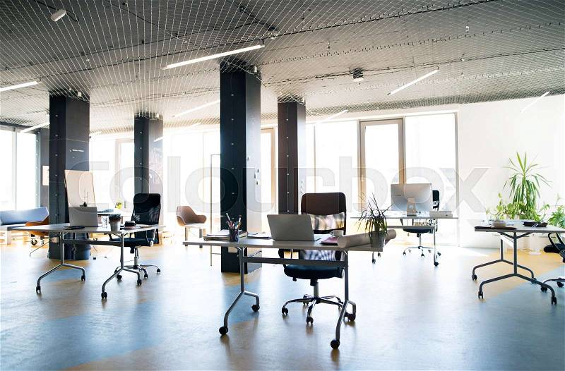 Big bright empty modern office after work. The interior of working office space, stock photo