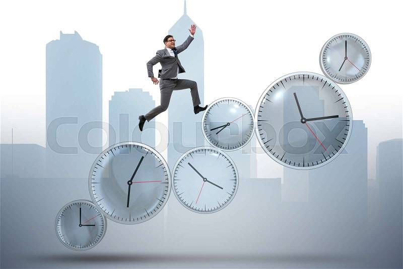 Businessman in time management concept, stock photo