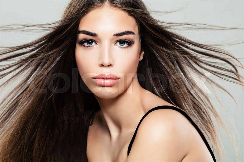 Fashion Portrait of Cute Brunette Woman with Long Hair and Makeup, stock photo