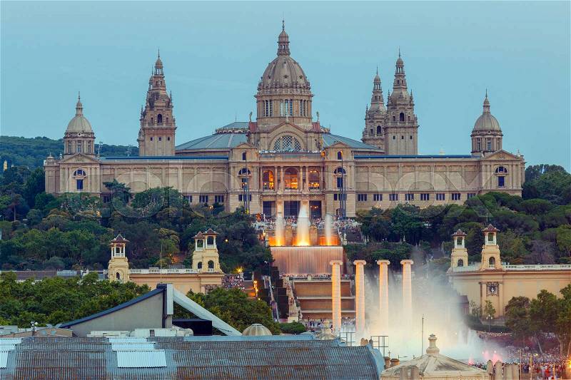 National Museum of Catalunya and the cascade of fountains in Barcelona at night, stock photo