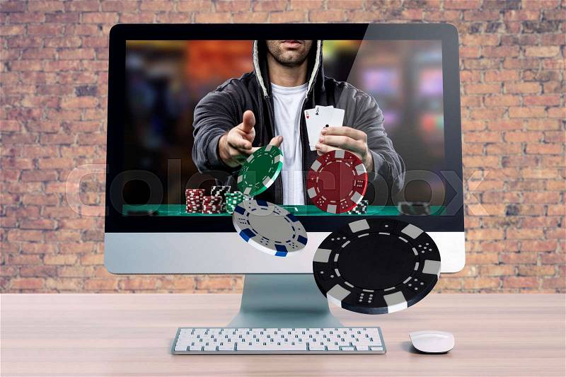 Online poker game, with the poker player coming out of the computer screen, stock photo