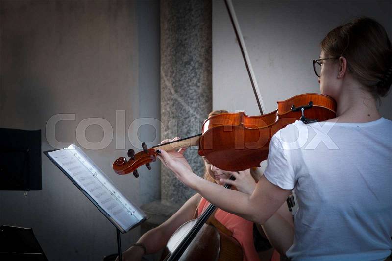 Female violin player, stock photo