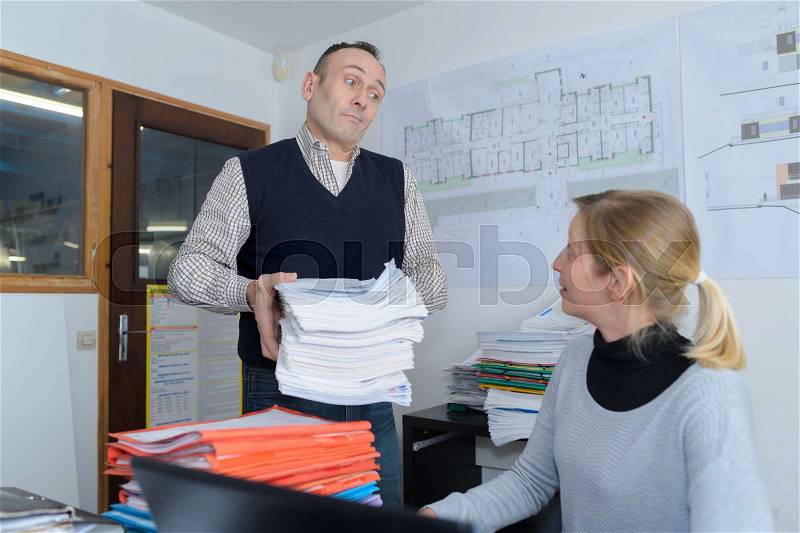 Boss give away work for her assistant, stock photo