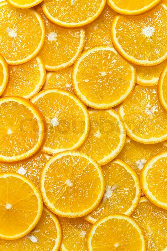 Background of fresh sliced citrus fruits close-up, stock photo