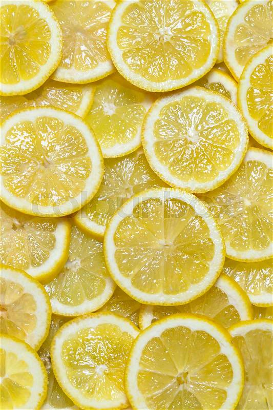 Background of fresh sliced citrus fruits close-up, stock photo