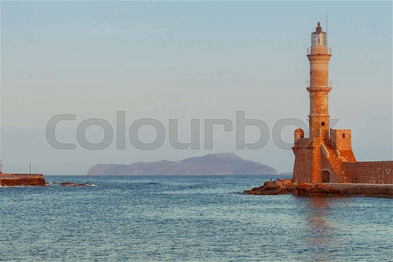 Medieval stone lighthouse at dawn. Chania. Crete. Greece, stock photo