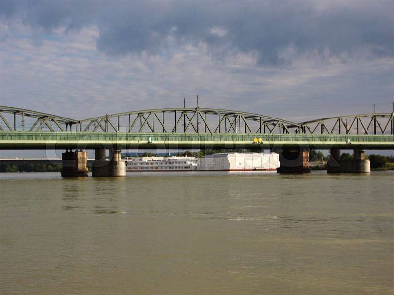 Green Metal Railroad Bridge in Vienna Crossing the River Donau, stock photo