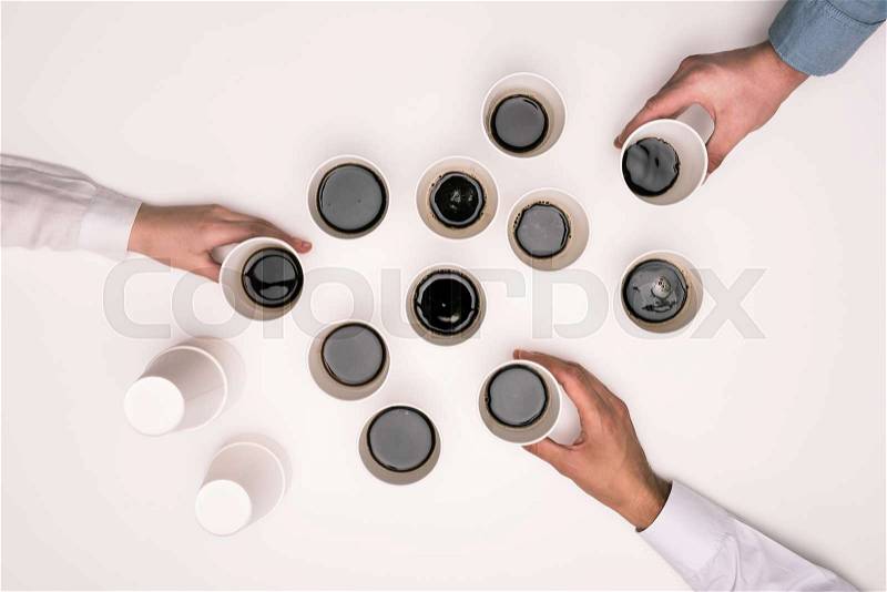 Top view of people taking disposable coffee cups isolated on white , stock photo