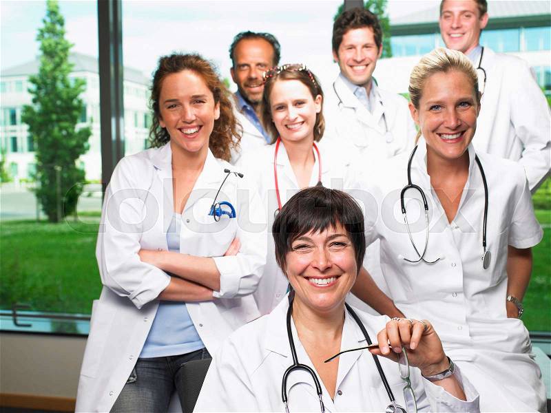 Group of doctors smiling, stock photo