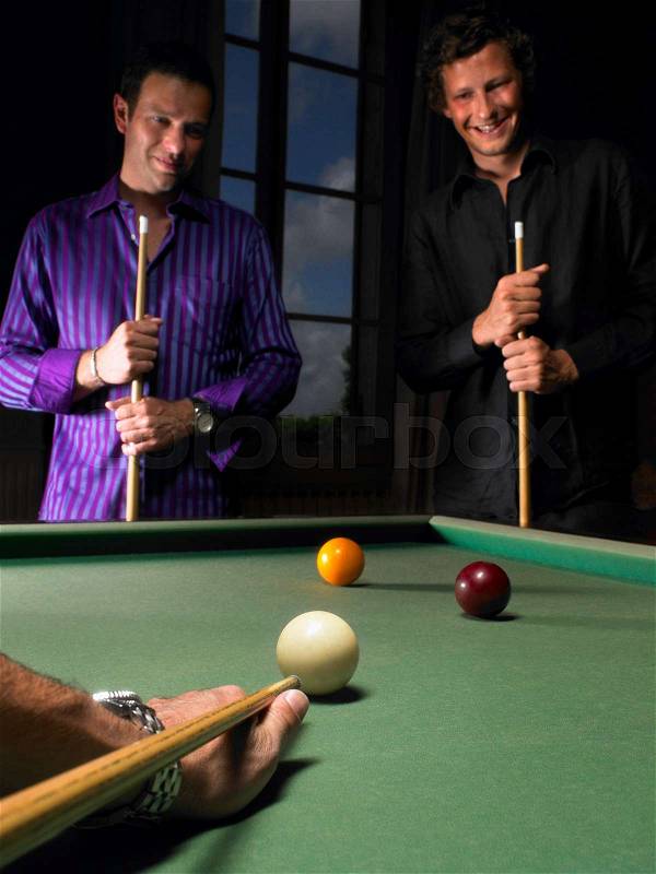 Men playing snooker, stock photo