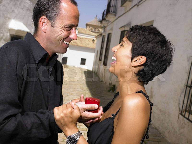 Man proposing to woman, stock photo