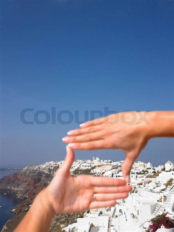 Woman\'s hands framing the view, stock photo